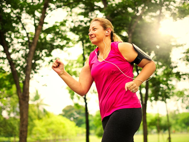 LM-lose-weight-after-menopause woman jogging, to illustrate healthy exercise supporting how to lose weight after menopause.